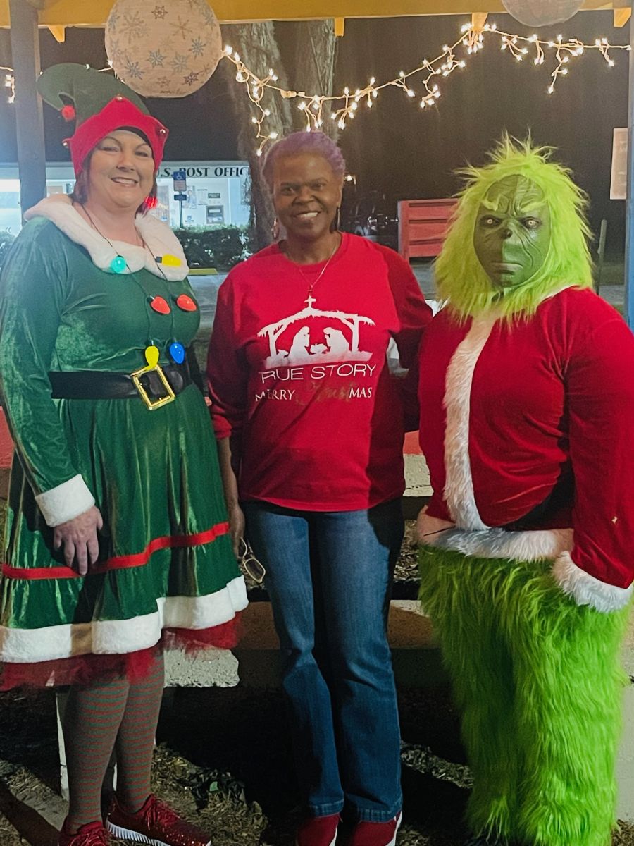 The grinch and two people