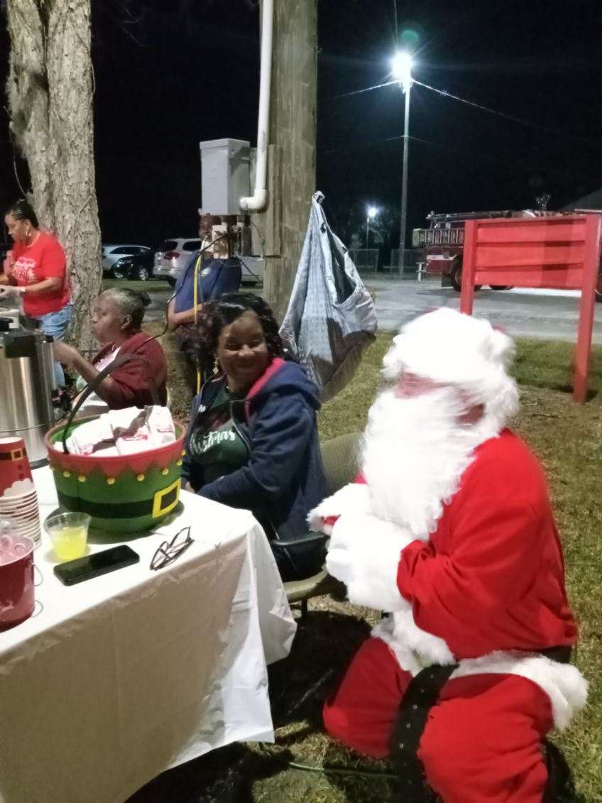 Santa with group of people